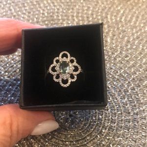 Beautiful aquamarine and white tops ring